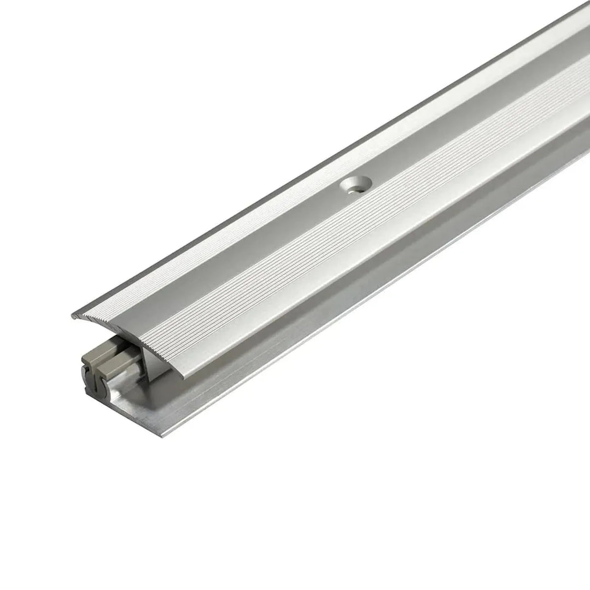 Close-up of the silver anodised multi-transition profile aluminium with partially grooved surface and drilled top profile