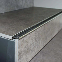 Treppenprofil mit rutschhemmender Einlage auf einer Treppenstufe mit Fliesenbelag verarbeitet #A0001724
#A0002701