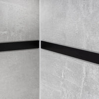 Profilé décoratif noir mat travaillé entre des carreaux gris #FR0005118
#FR0005119
#FR0005120